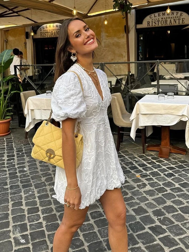 Short puff-sleeve mini dress with embroidery and V-neck