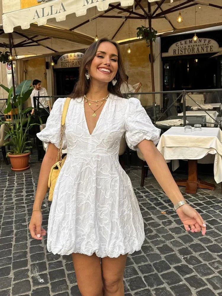 Short puff-sleeve mini dress with embroidery and V-neck