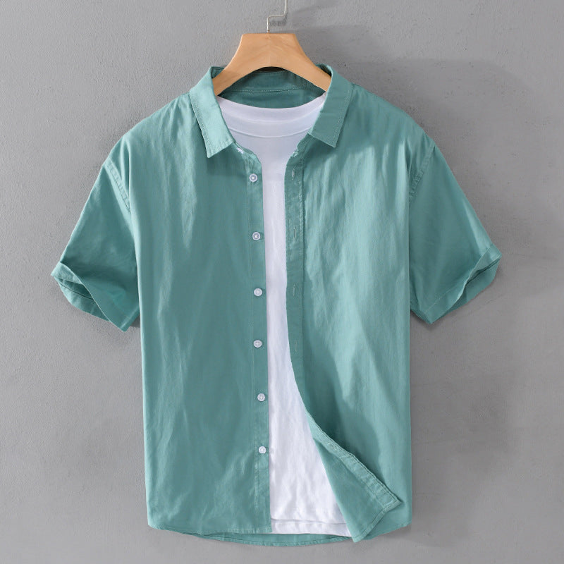 Men's short-sleeve cotton shirt with tropical print and spread collar