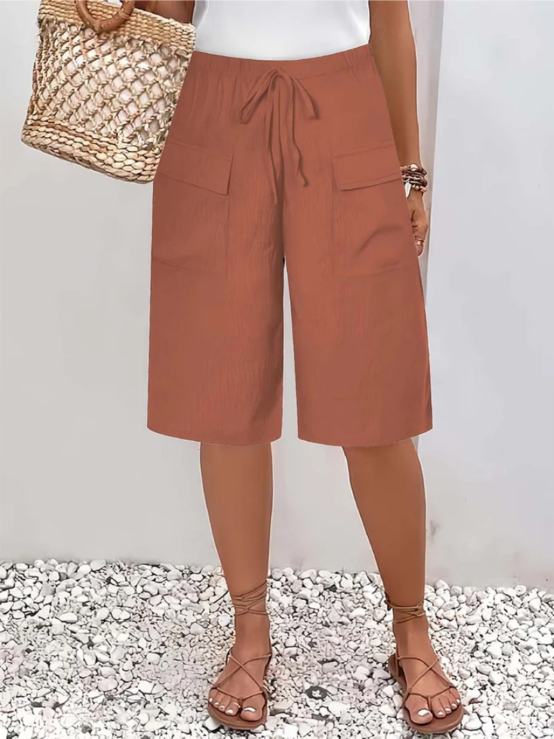 Pantaloncini donna con vita elastica, coulisse e tasche cargo