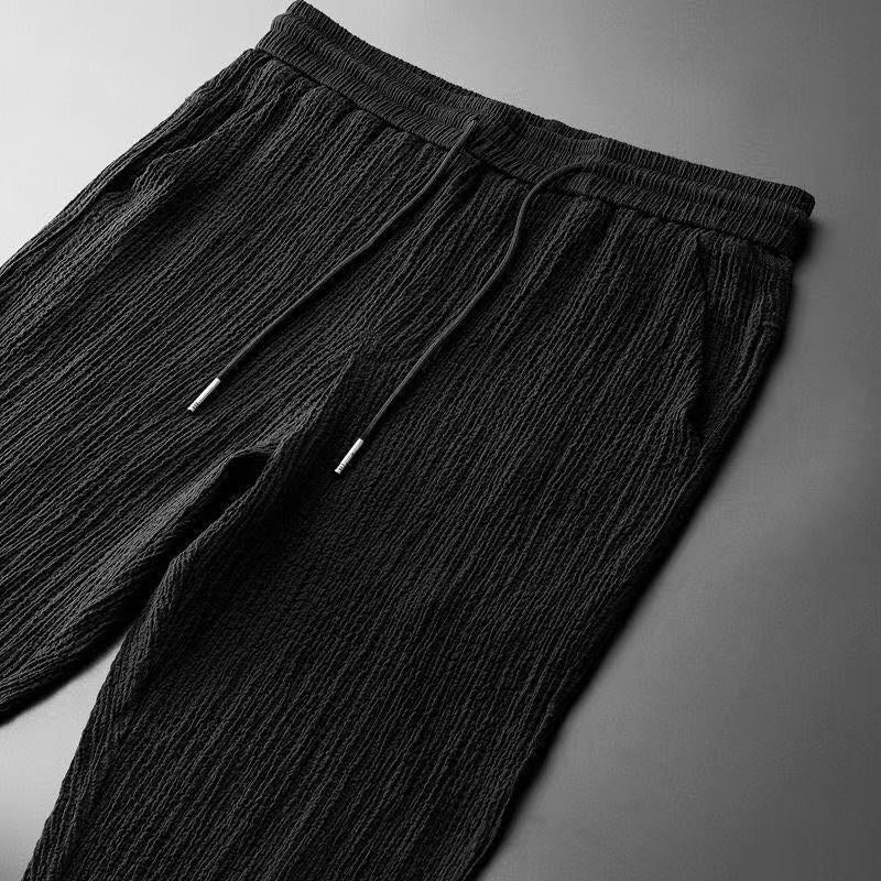 Completo casual da uomo con maglietta a scollo a V e pantaloni con vita elastica